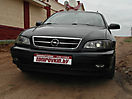 Тонировка передней оптики Opel Omega B